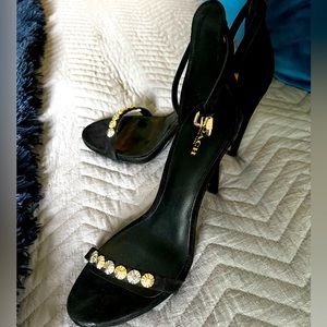 Coach black and gold heels size ten